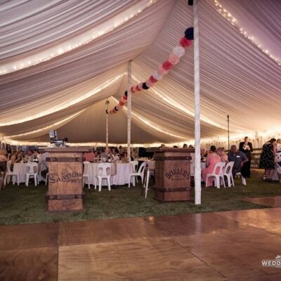 Marquee Hire at Ashburton event showing silk lining and fairy lights and dance flooring